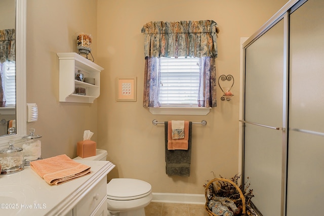 1045 Edenton Dr NW, Calabash, NC 28467 - bathroom featuring a shower with shower door, vanity, and tile patterned floors