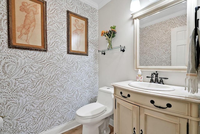 311 Lennox Pl, Wilmington, NC 28412 - bathroom featuring vanity, ornamental molding, and wallpapered walls