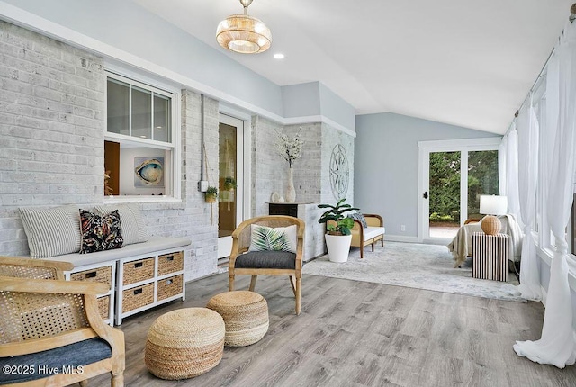 311 Lennox Pl, Wilmington, NC 28412 - sitting room with lofted ceiling, wood finished floors, and a fireplace