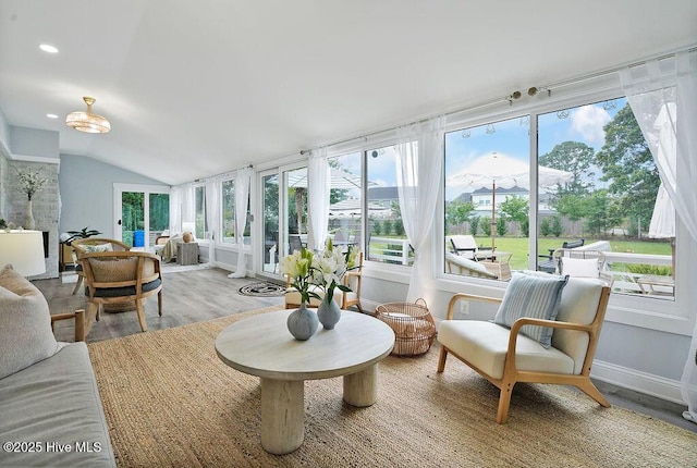 311 Lennox Pl, Wilmington, NC 28412 - sunroom featuring lofted ceiling, wood finished floors, and recessed lighting