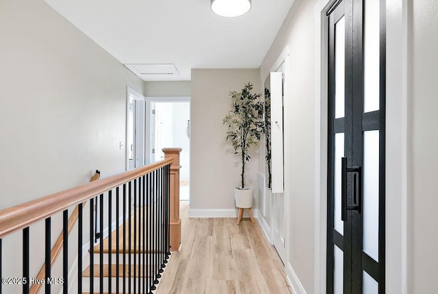 311 Lennox Pl, Wilmington, NC 28412 - hall with an upstairs landing, light wood-type flooring, and attic access