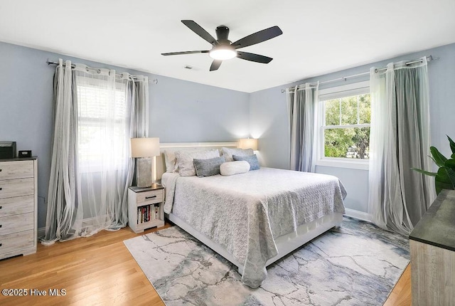 311 Lennox Pl, Wilmington, NC 28412 - bedroom featuring light wood-style flooring and a ceiling fan