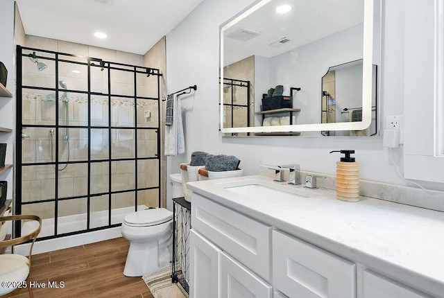 311 Lennox Pl, Wilmington, NC 28412 - bathroom featuring vanity, a shower stall, and wood finished floors
