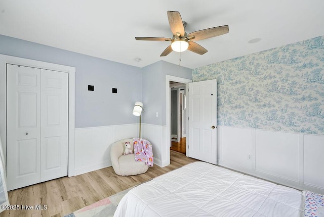 311 Lennox Pl, Wilmington, NC 28412 - bedroom with wood finished floors, wainscoting, and a ceiling fan