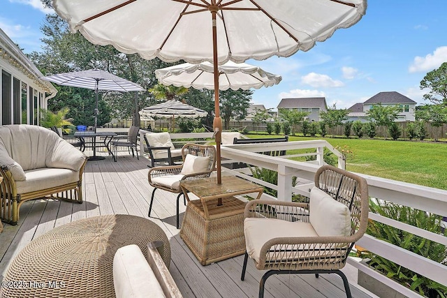 311 Lennox Pl, Wilmington, NC 28412 - wooden deck featuring outdoor dining area and a fenced backyard