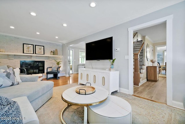 311 Lennox Pl, Wilmington, NC 28412 - living area featuring ornamental molding, light wood finished floors, and recessed lighting