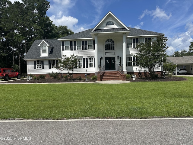 2270 Bella Coola Rd, Lake Waccamaw, NC 28450 - greek revival inspired property featuring crawl space, a front lawn, and roof with shingles
