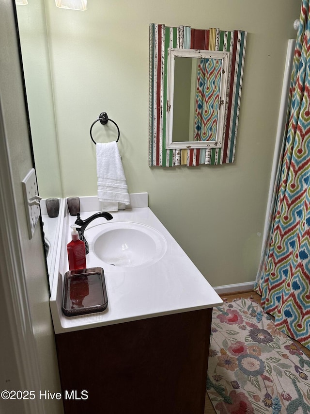 2270 Bella Coola Rd, Lake Waccamaw, NC 28450 - bathroom with vanity and baseboards