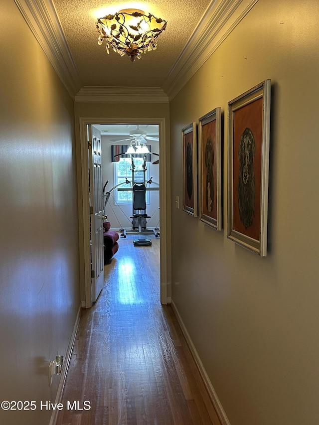 2270 Bella Coola Rd, Lake Waccamaw, NC 28450 - corridor with ornamental molding and wood finished floors