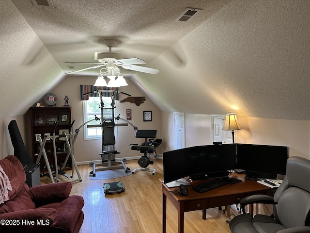 2270 Bella Coola Rd, Lake Waccamaw, NC 28450 - office area with a ceiling fan, a textured ceiling, light wood-style floors, and lofted ceiling