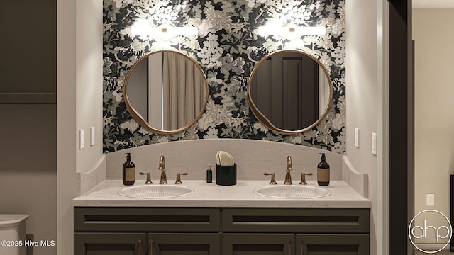 259 Sycamore Forest Dr, Wallace, NC 28466 - bathroom with wallpapered walls and double vanity