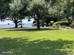 102 W Eden St, Edenton, NC 27932 - view of property's community with a water view and a yard