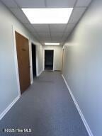 102 W Eden St, Edenton, NC 27932 - hallway with a drop ceiling and baseboards