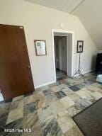 102 W Eden St, Edenton, NC 27932 - additional living space with vaulted ceiling and baseboards