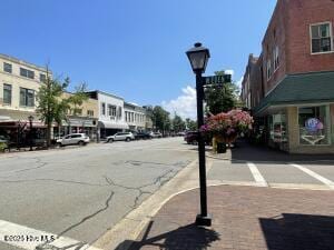 102 W Eden St, Edenton, NC 27932 - view of asphalt road with street lights and sidewalks