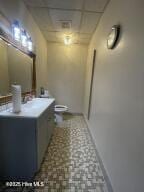 102 W Eden St, Edenton, NC 27932 - bathroom with vanity and a drop ceiling