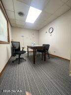 102 W Eden St, Edenton, NC 27932 - playroom with a drop ceiling and carpet flooring