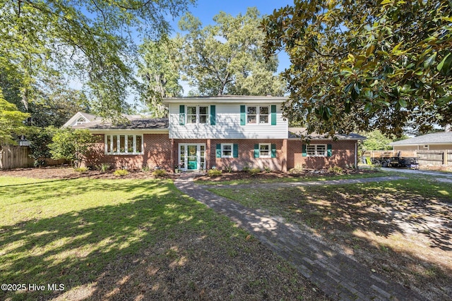 604 W Wilson Creek Dr, Trent Woods, NC 28562 - tri-level home featuring brick siding