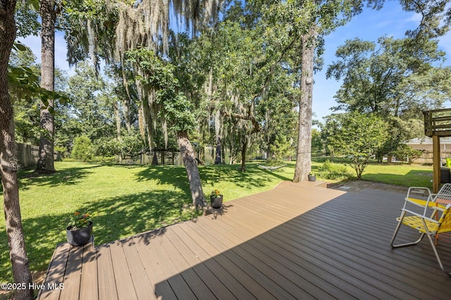 604 W Wilson Creek Dr, Trent Woods, NC 28562 - wooden terrace with a lawn and view of scattered trees