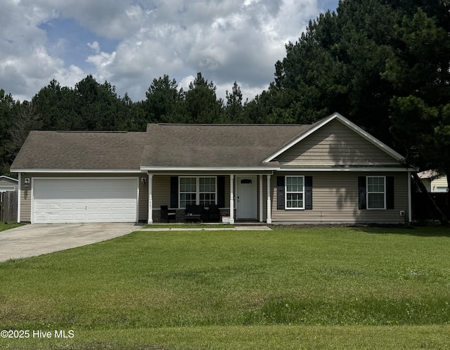 461 Springhill Rd, Maysville, NC 28555 - ranch-style home with concrete driveway, a garage, a porch, and a front yard