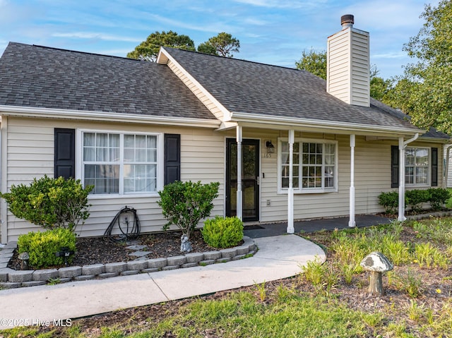 165 Parnell Rd, Hubert, NC 28539 - single story home with a chimney and a shingled roof