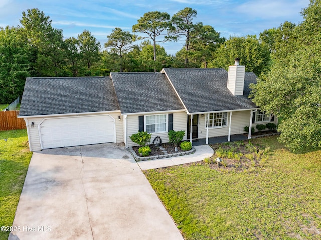 165 Parnell Rd, Hubert, NC 28539 - view of front of house with driveway, a garage, a chimney, a shingled roof, and a porch