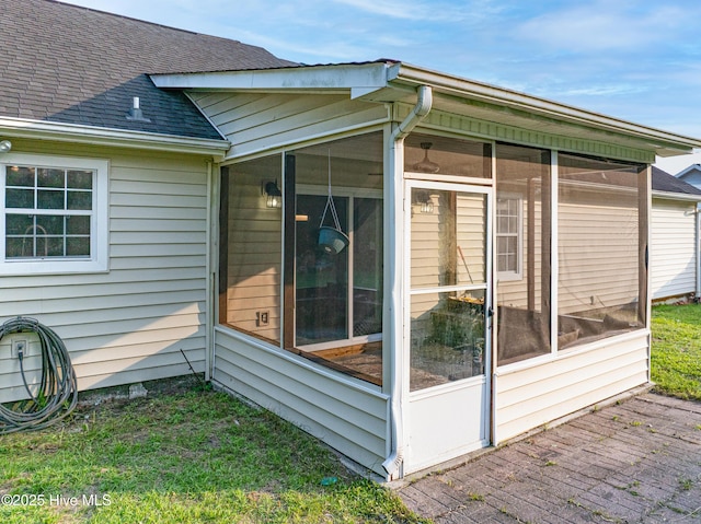 165 Parnell Rd, Hubert, NC 28539 - view of side of property featuring a sunroom and roof with shingles