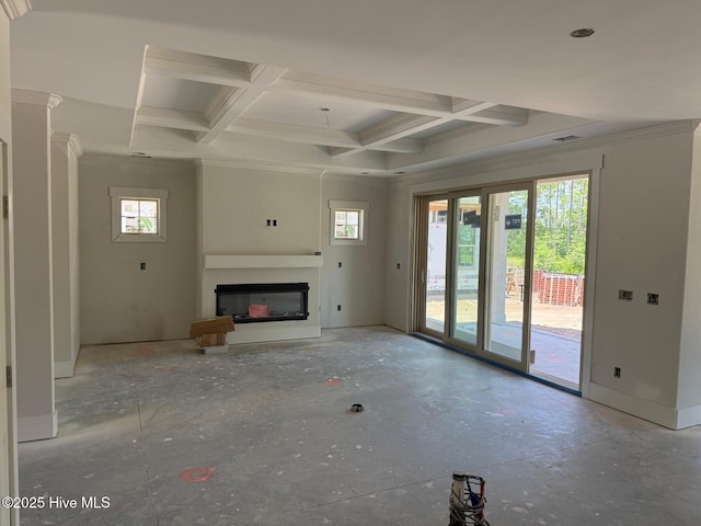 453 Motts Forest Rd Unit 70, Wilmington, NC 28412 - unfurnished living room with plenty of natural light, coffered ceiling, a glass covered fireplace, beamed ceiling, and crown molding