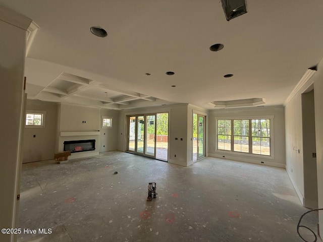 453 Motts Forest Rd Unit 70, Wilmington, NC 28412 - unfurnished living room featuring plenty of natural light, a fireplace, coffered ceiling, beamed ceiling, and crown molding