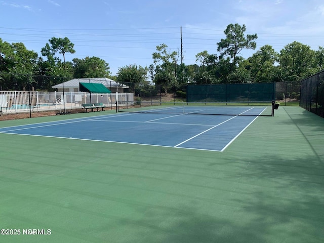 453 Motts Forest Rd Unit 70, Wilmington, NC 28412 - view of tennis court with community basketball court