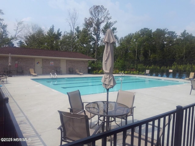 453 Motts Forest Rd Unit 70, Wilmington, NC 28412 - community pool featuring a patio