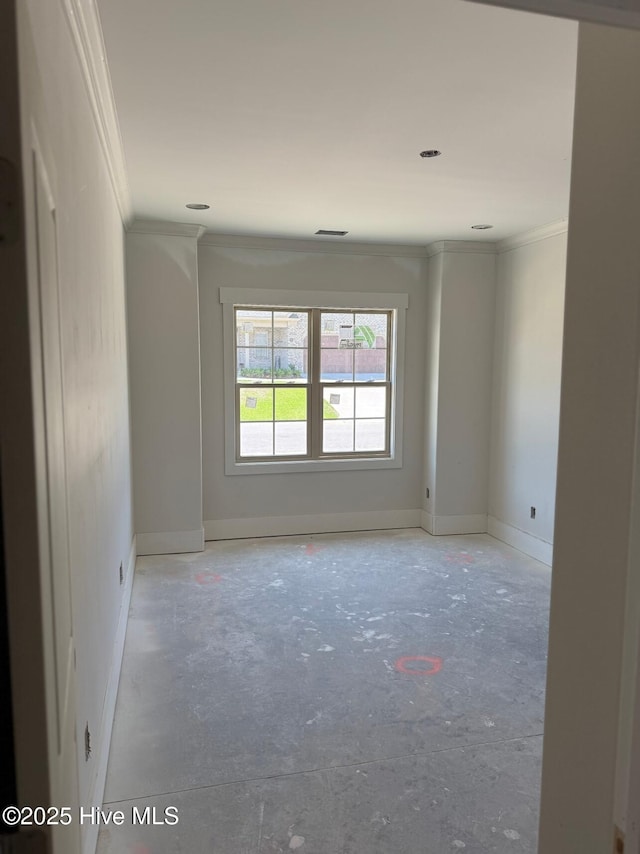 453 Motts Forest Rd Unit 70, Wilmington, NC 28412 - spare room featuring ornamental molding