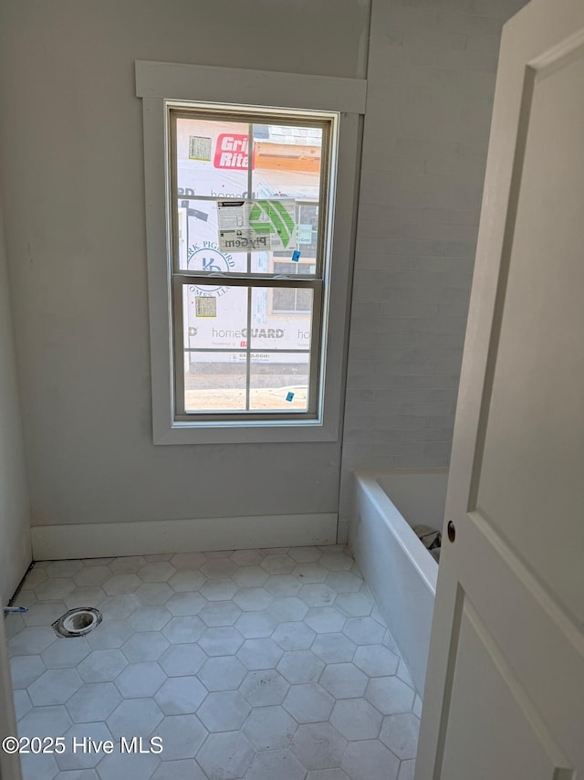 453 Motts Forest Rd Unit 70, Wilmington, NC 28412 - bathroom with a bathtub and tile patterned flooring