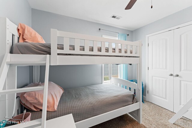 126 NW 14th St, Oak Island, NC 28465 - bedroom with speckled floor, a closet, and ceiling fan