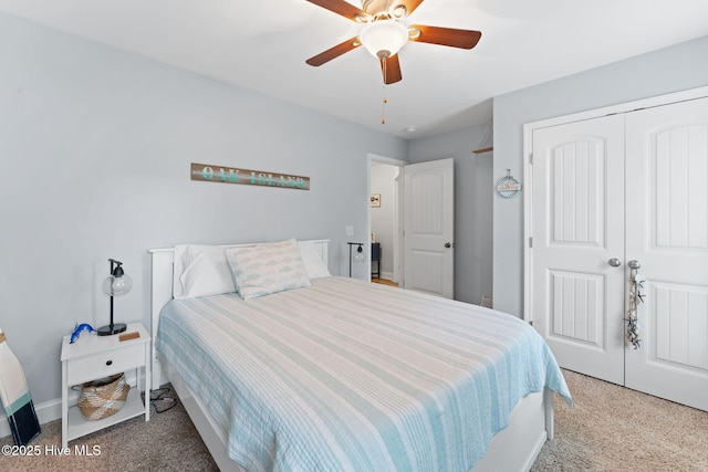 126 NW 14th St, Oak Island, NC 28465 - bedroom featuring carpet flooring, a closet, and ceiling fan