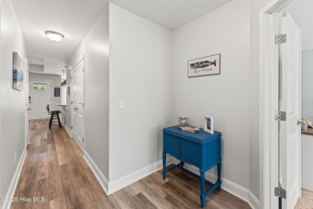 126 NW 14th St, Oak Island, NC 28465 - hallway with wood finished floors and baseboards