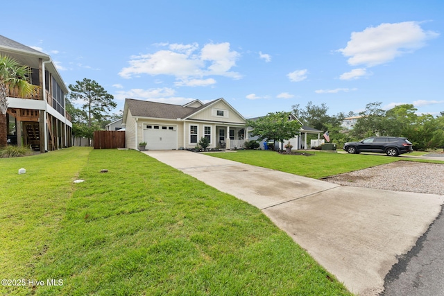 126 NW 14th St, Oak Island, NC 28465 - view of front of home with concrete driveway, a garage, and stairway