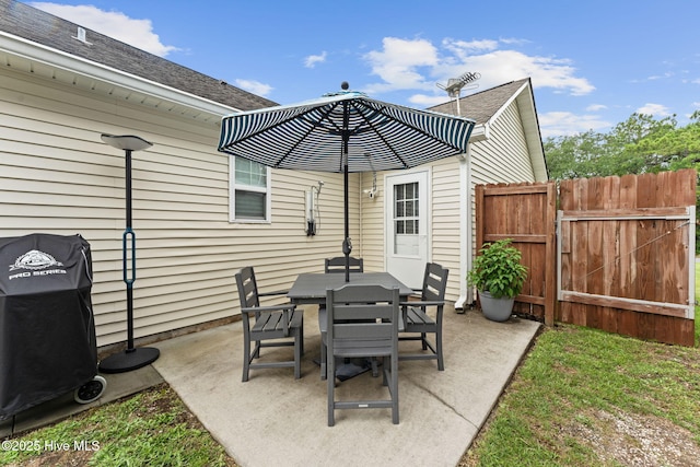 126 NW 14th St, Oak Island, NC 28465 - view of patio / terrace with outdoor dining space