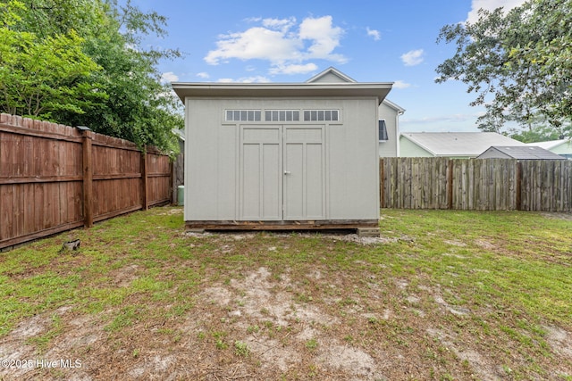 126 NW 14th St, Oak Island, NC 28465 - view of shed featuring a fenced backyard