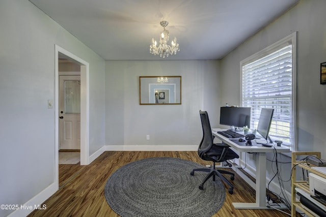3921 Westover Rd, Wilmington, NC 28403 - home office with a chandelier and wood finished floors