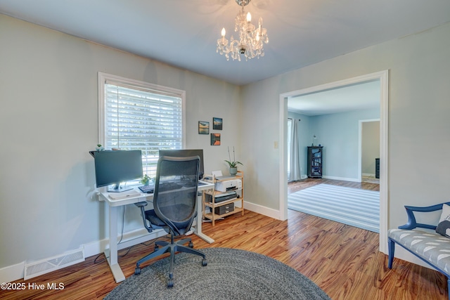 3921 Westover Rd, Wilmington, NC 28403 - office featuring wood finished floors and a chandelier