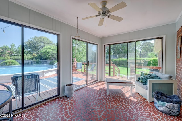 3921 Westover Rd, Wilmington, NC 28403 - unfurnished sunroom featuring a ceiling fan