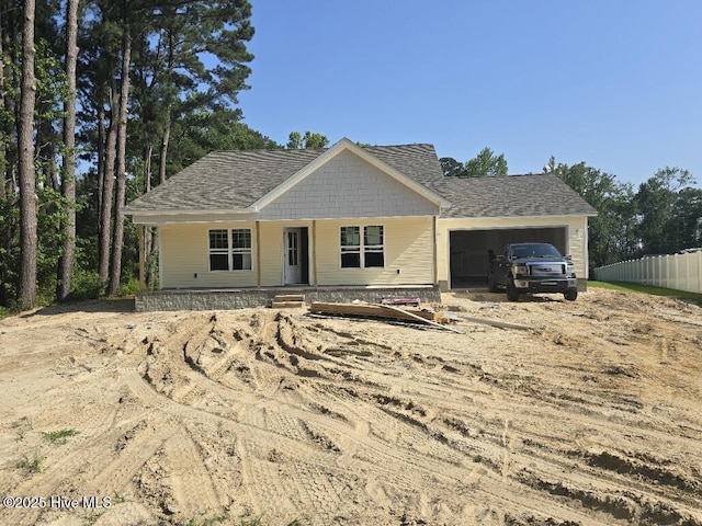 94 Osprey Watch Ln E, Oriental, NC 28571 - view of front of home with a garage and covered porch