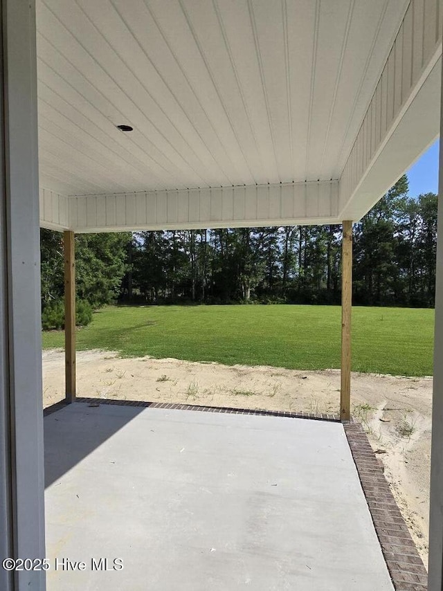 94 Osprey Watch Ln E, Oriental, NC 28571 - view of patio with view of wooded area