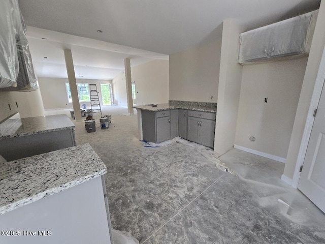 94 Osprey Watch Ln E, Oriental, NC 28571 - kitchen featuring gray cabinets, a peninsula, and open floor plan