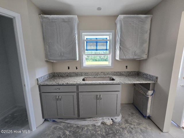 94 Osprey Watch Ln E, Oriental, NC 28571 - kitchen featuring gray cabinets and light stone countertops