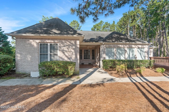 183 Baker Cir W, End, NC 27376 - view of front of home with brick siding and roof with shingles