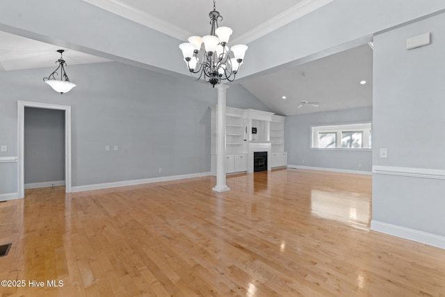 183 Baker Cir W, End, NC 27376 - unfurnished living room featuring vaulted ceiling, ornamental molding, light wood-type flooring, a fireplace, and a chandelier