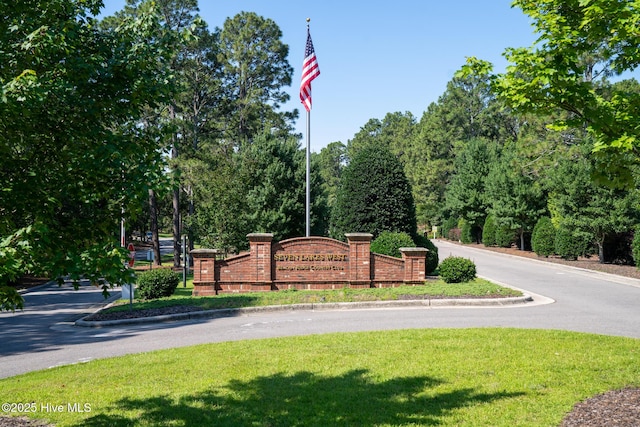 183 Baker Cir W, End, NC 27376 - community / neighborhood sign featuring a lawn
