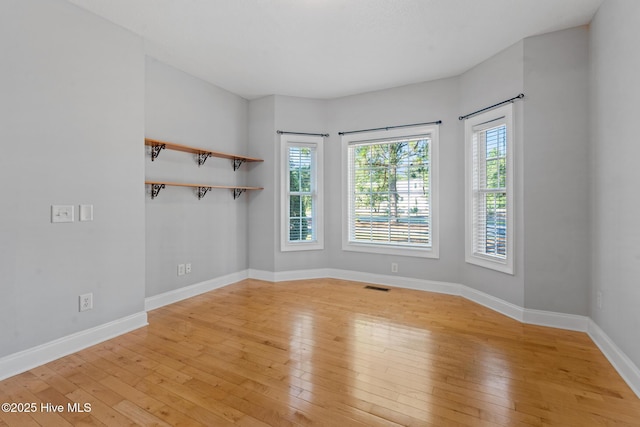 183 Baker Cir W, End, NC 27376 - empty room featuring light wood-style floors and baseboards